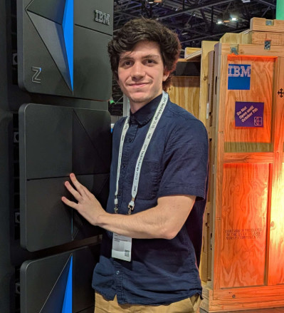 Jon Rutan with a z17 IBM Mainframe at the 2025 IBM TechXchange